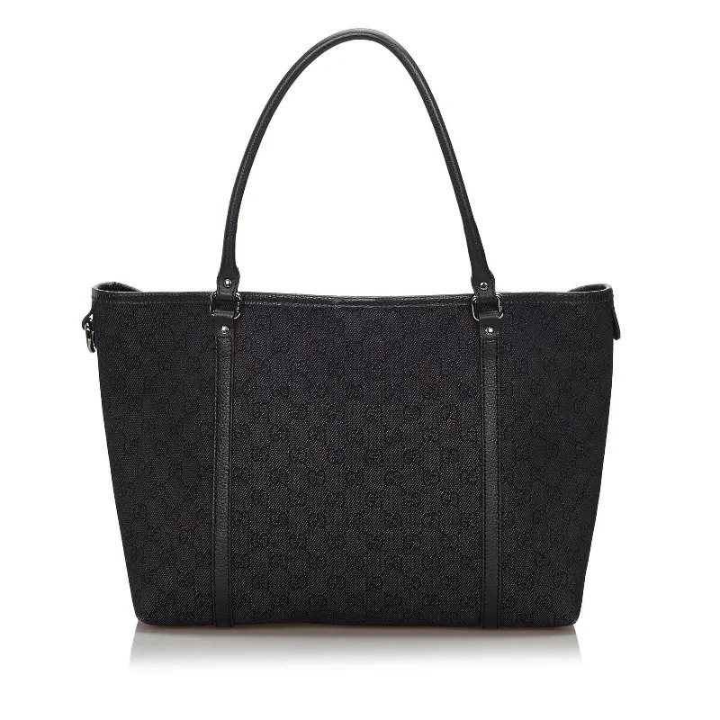 Women Gucci Sylvie bags featuring the signature web stripeGucci Black Canvas Fabric GG Tote Bag Italy