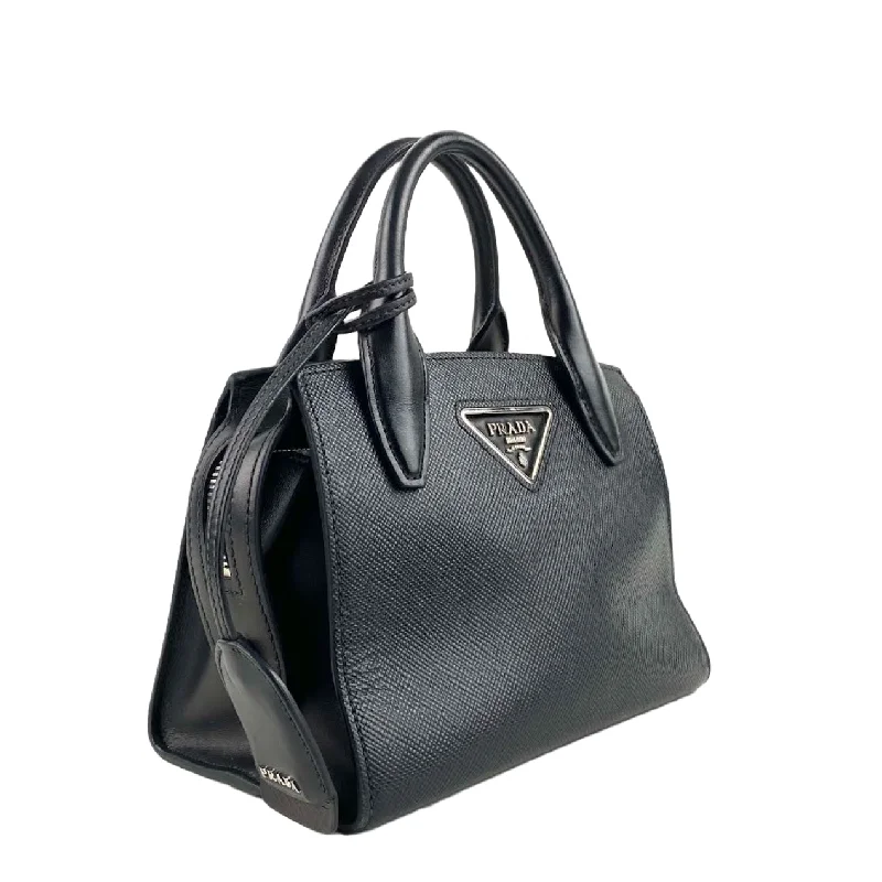 Prada handbags with a perforated leather detail for a unique and breathable designPRADA Saffiano Small Kristen Black - OUTLET FINAL SALE