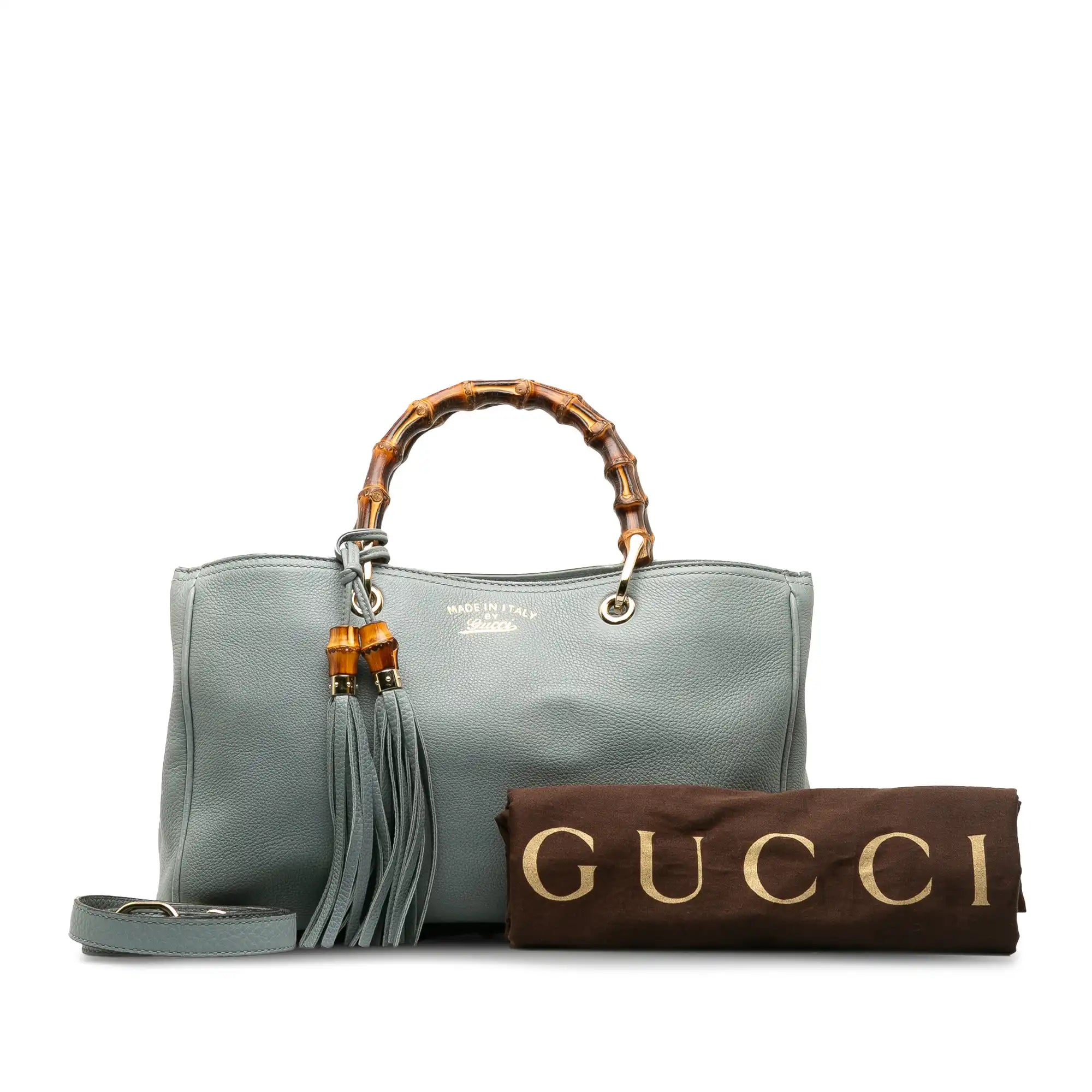 Women Gucci Sylvie bags with a crystal - embellished web stripeGucci Bamboo Shopper Medium Blue Leather