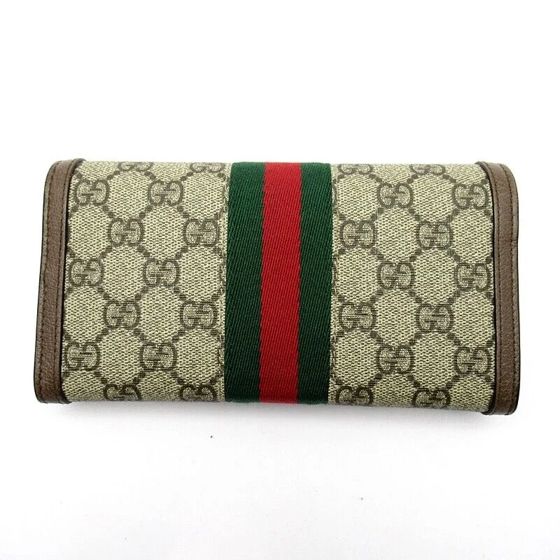 Gucci Marmont bags for women with a contrast - colored interiorGucci Gg Continental Wallet Supreme