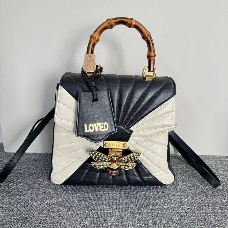 Gucci handbags for women with a back - zip pocketGucci Sylvie Black White Leather Bamboo Handle Shoulder Bag