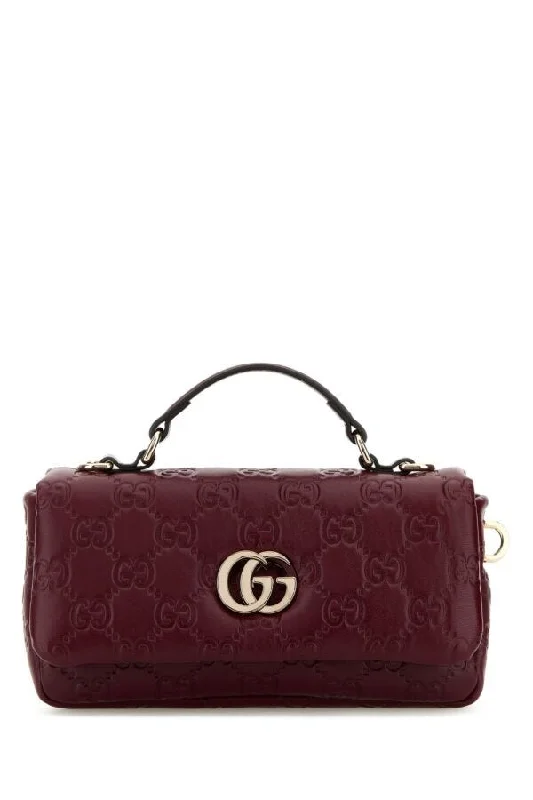 Women Gucci Sylvie bags with a crystal - embellished web stripeGucci Women Burgundy Leather Mini Gg Milano Handbag