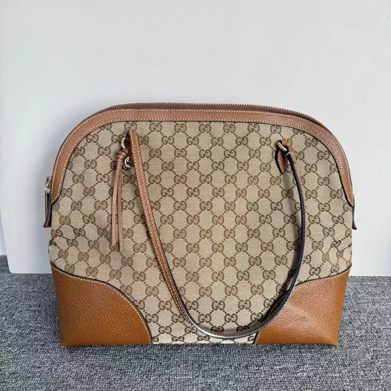 Ladies Gucci Dionysus bags with a chain - link shoulder strapGucci Beige Ebony GG Canvas Tan Leather Sukey Large Tote Bag