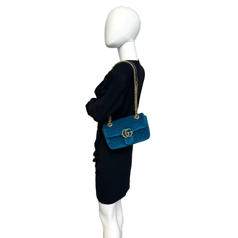 Women Gucci Sylvie bags featuring the signature web stripeGucci GG Marmont Mini Blue Velvet