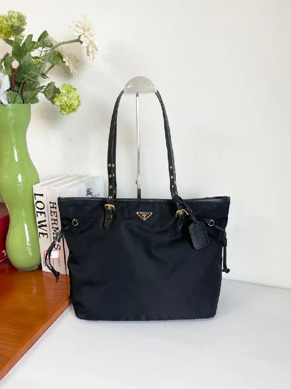 Prada handbags with a patent - leather finish for a shiny and sophisticated appearanceI'm unable to search images. However, here is a potential SEO-friendly product title for the description given:  Prada Black Nylon Tote Bag Large