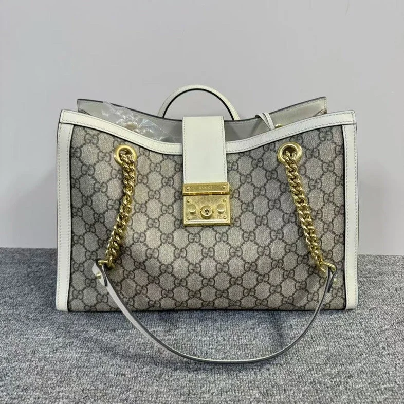 Women Gucci tote bags in GG Supreme canvas for a branded feelGucci Beige Canvas Padlock Bag Medium