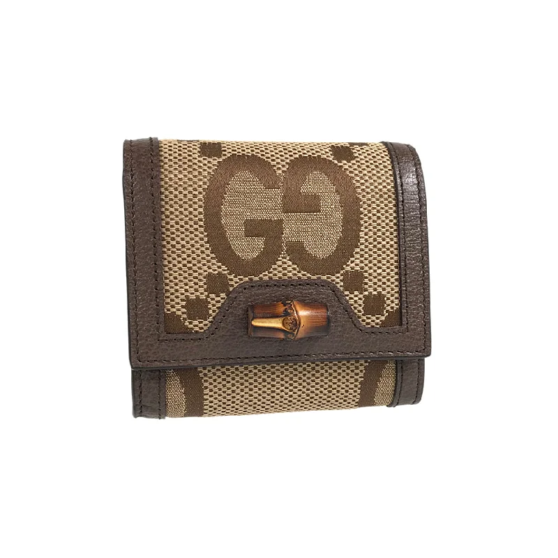 Ladies Gucci shoulder bags with a tassel decorationGUCCI Diana Bamboo Compact Wallet wallet