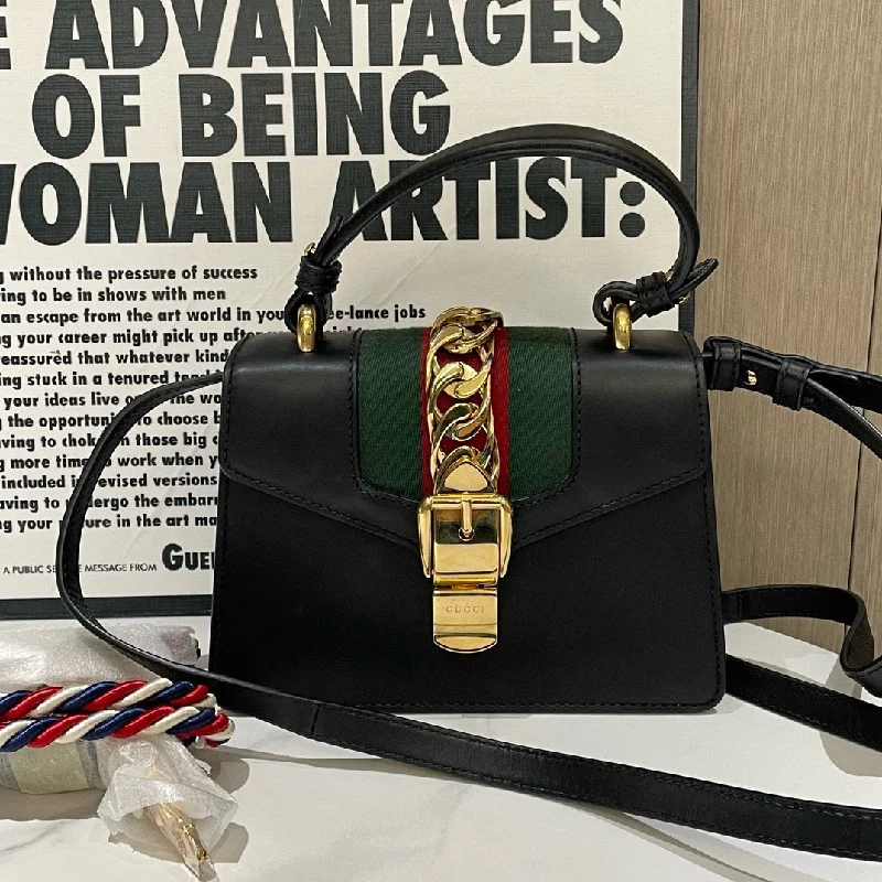 Gucci backpacks for women with a hidden back pocketGucci Sylvie Black Leather Green Red Web Small Shoulder Bag