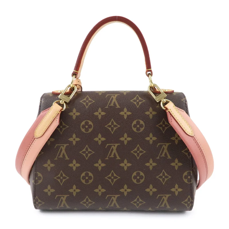 Louis Vuitton bags with a snap - button closure and a decorative charm for styleLouis Vuitton Monogram Cluny BB 2WAY Bag Hand Bag M44267