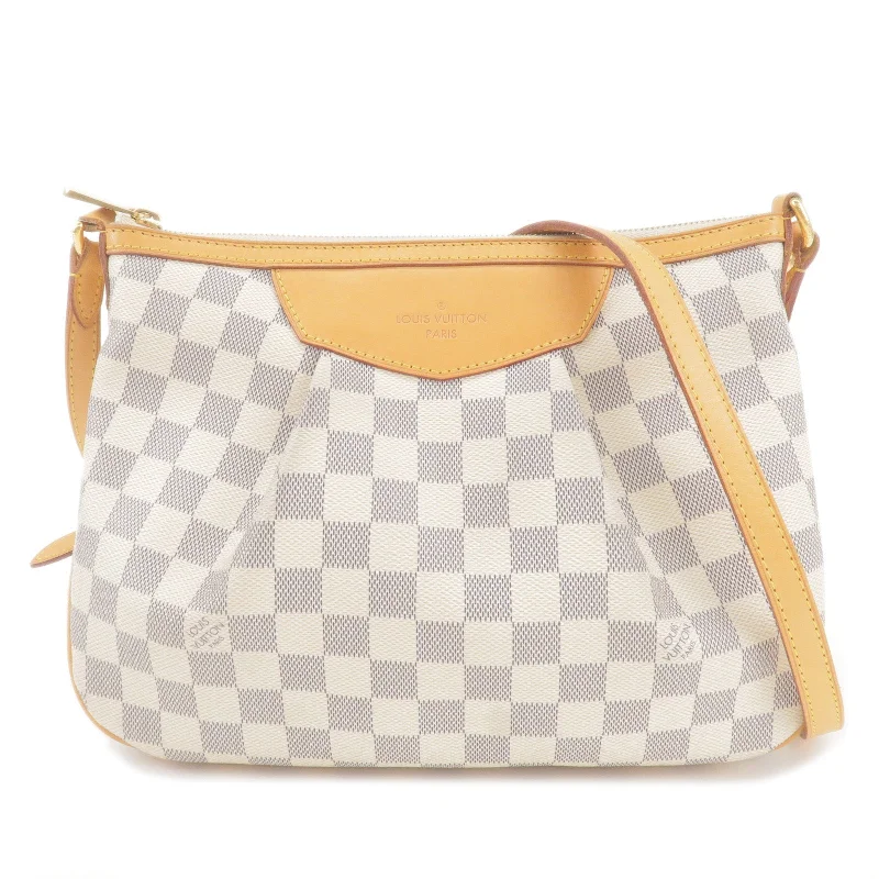 Ladies Louis Vuitton Capucines bags with gold - toned hardwareLouis Vuitton Damier Azur Siracusa PM Shoulder Bag N41113