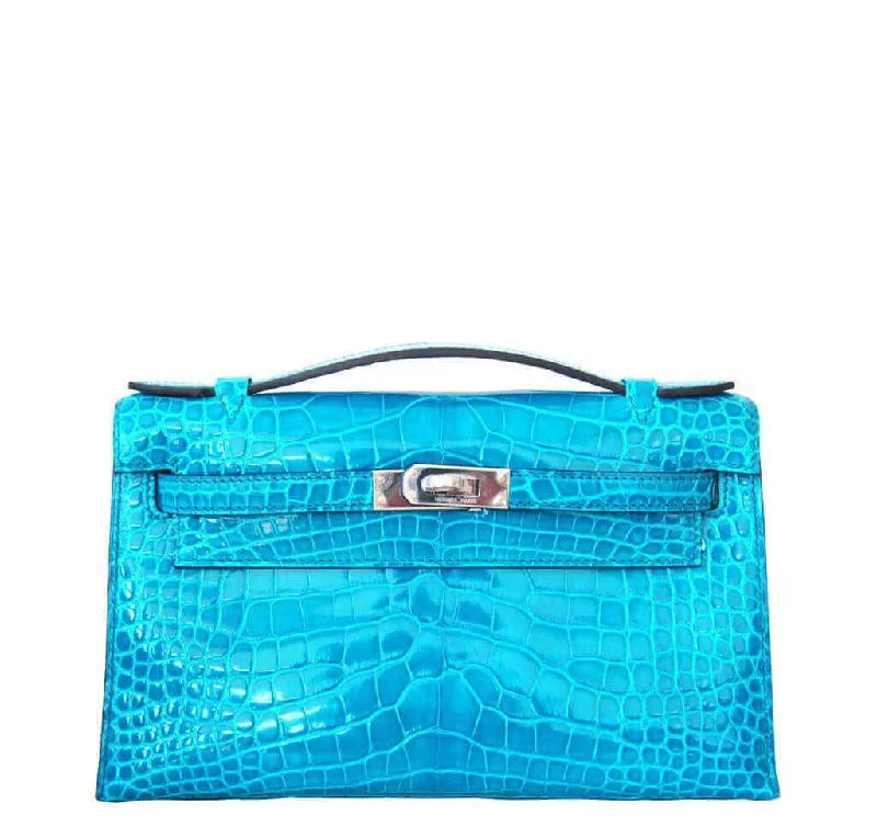 Hermes Lindy Bags in Seasonal Print CollaborationsHermès Kelly Bags with a single - handle design for simplicityHermès Alligator Kelly Pochette Mini Bag Blue Izmir